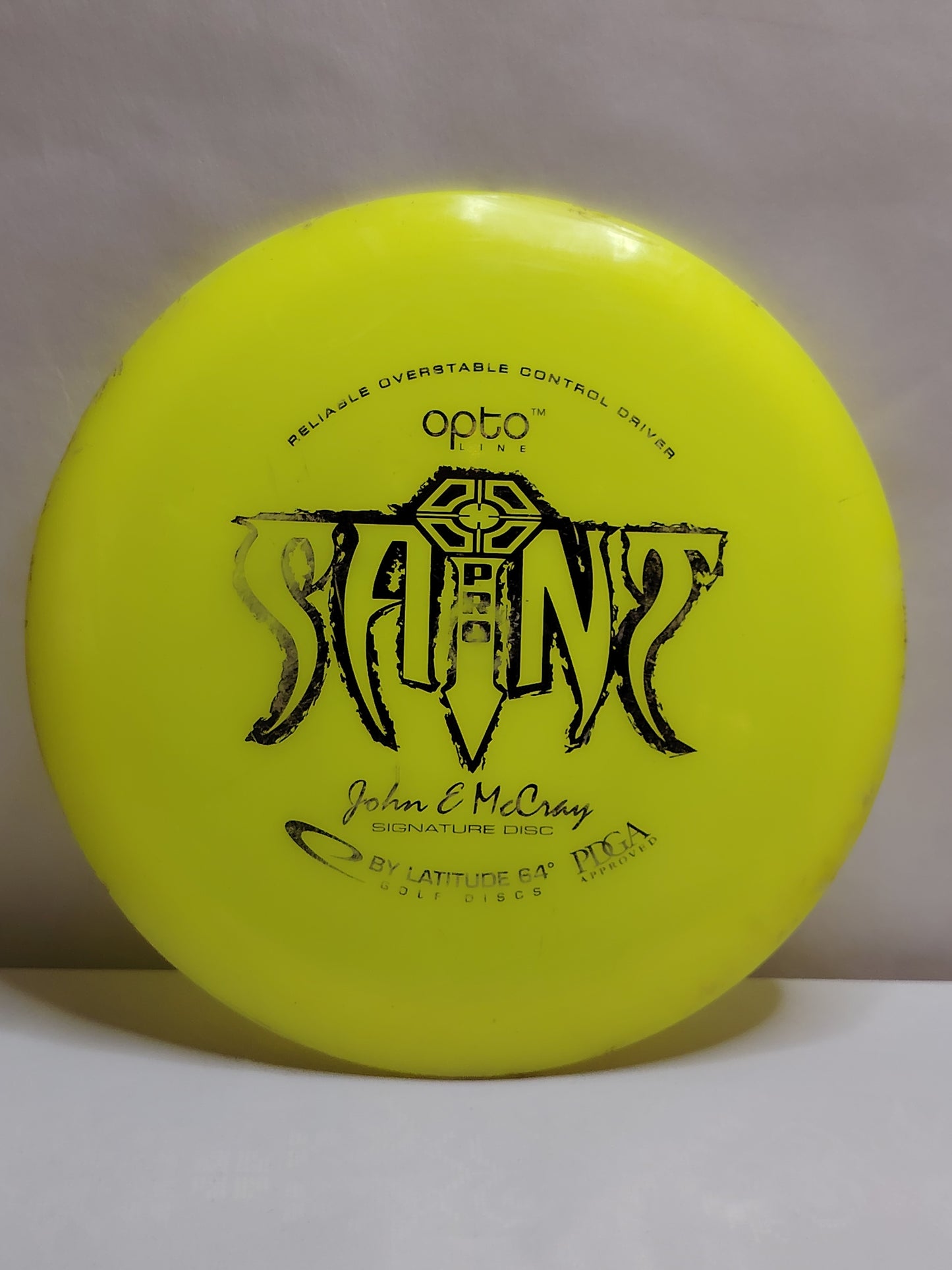Latitude 64 Opto Saint Pro – John E McCray, Keltainen, 174 g, Kunto: B