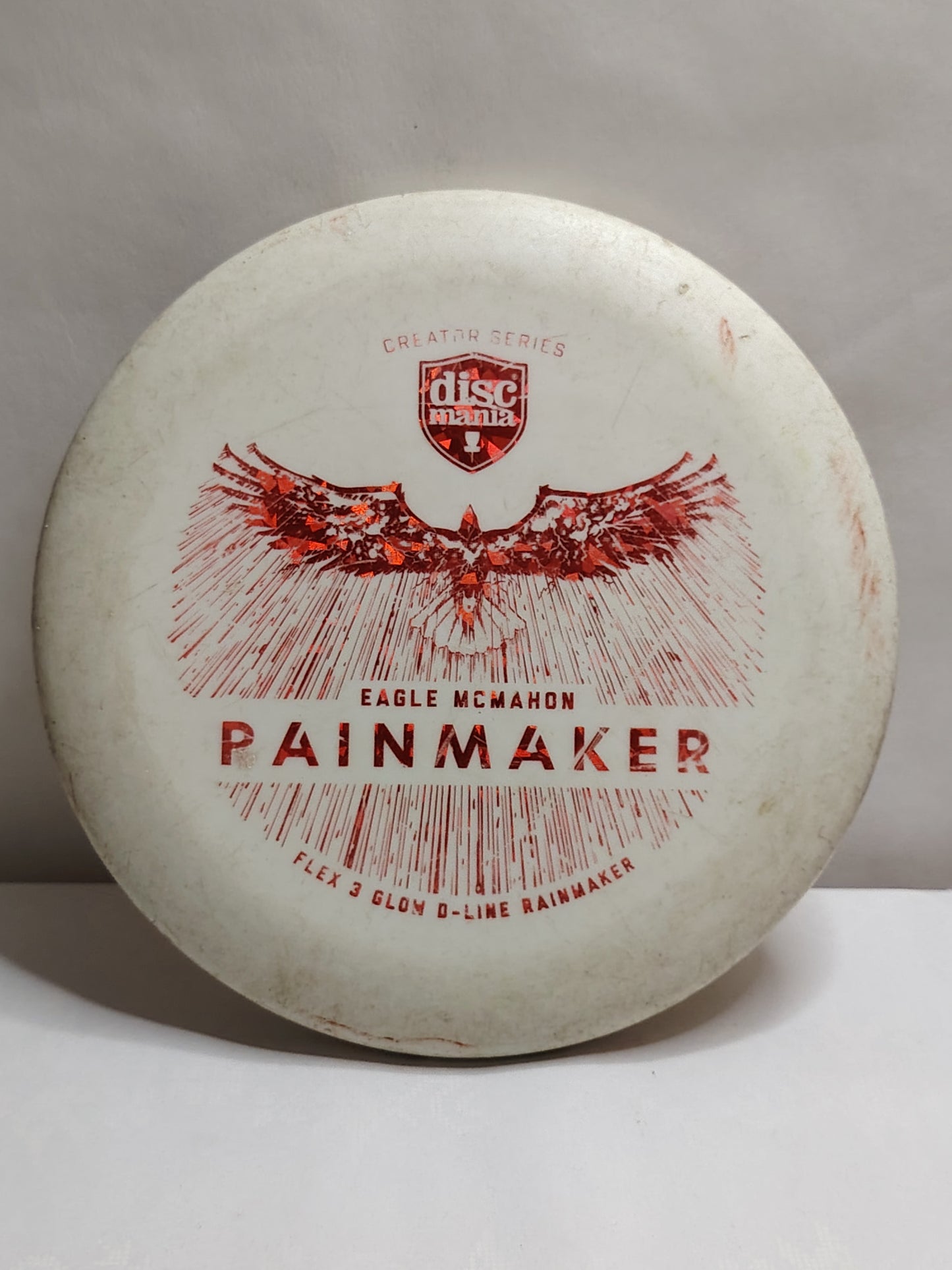 Discmania Flex 3 Glow D-Line Rainmaker 176g – Eagle McMahon Signature Series – Valkoinen, Kunto: B