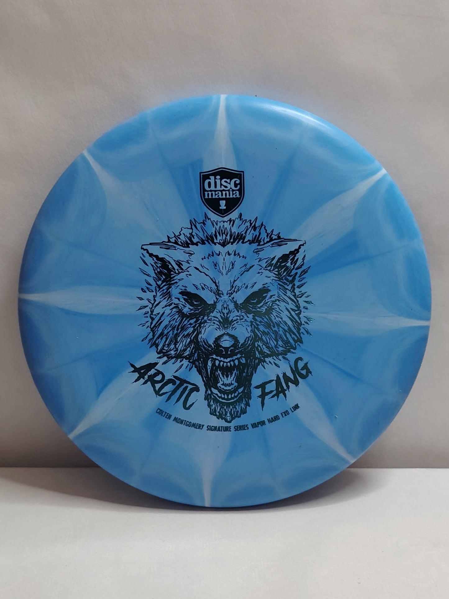 Discmania Arctic Fang Vapor Hard Exo Link – Colten Montgomery Signature – Sininen, 173 g, Kunto: A / Käyttämätön