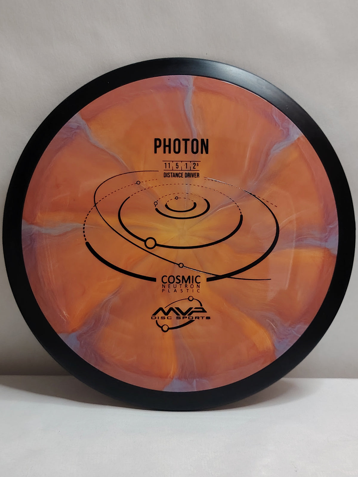 MVP Discs Photon – Cosmic Neutron, oranssi/liila, 174 g, Kunto: A-